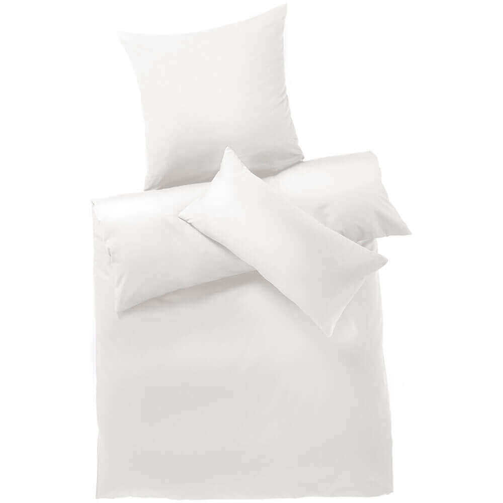 Bed linen is standard organic cotton, white